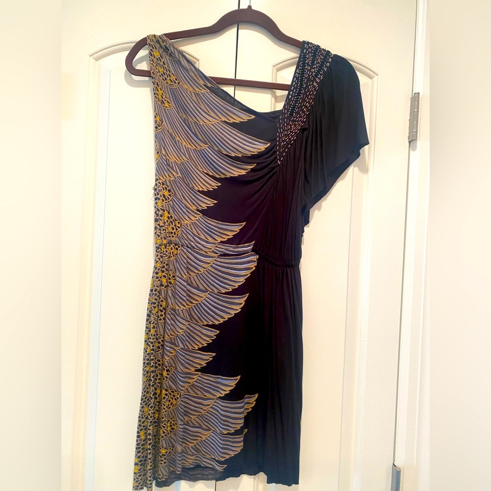 Little short Dress with sequin shoulder details.